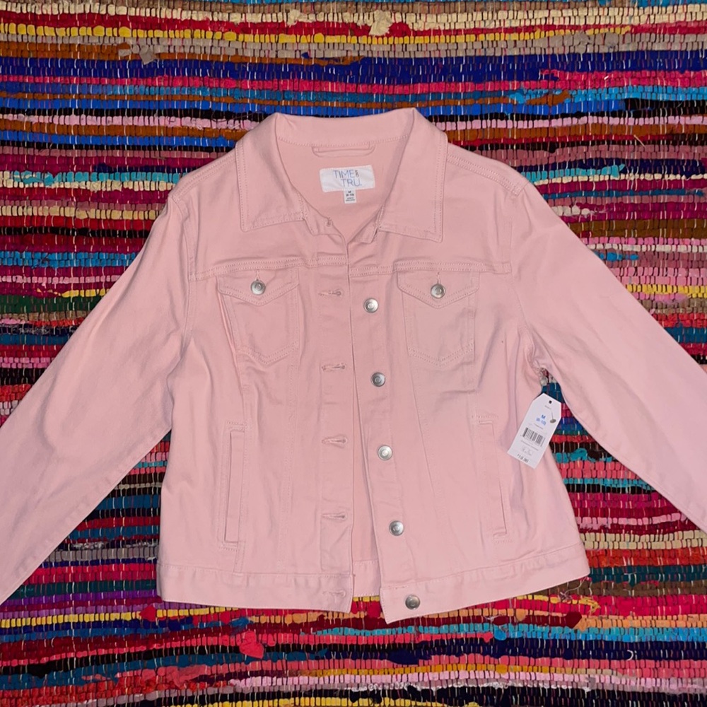 Never worn light pink jean jacket size medium